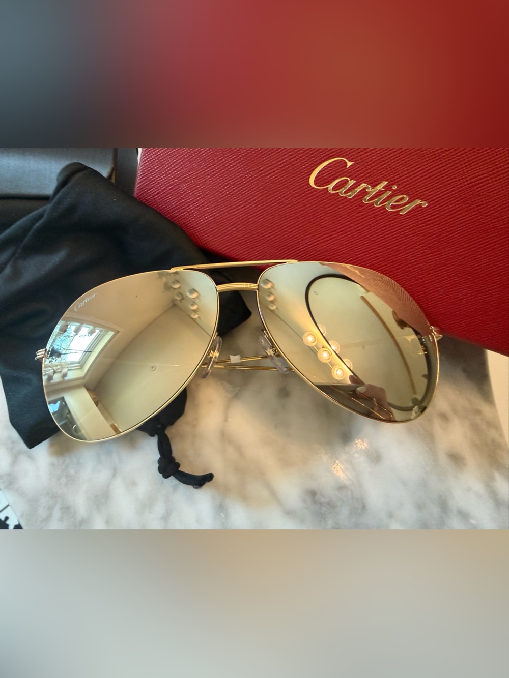 Cartier Gold Aviator Sunglasses with Reflective Gold Lenses